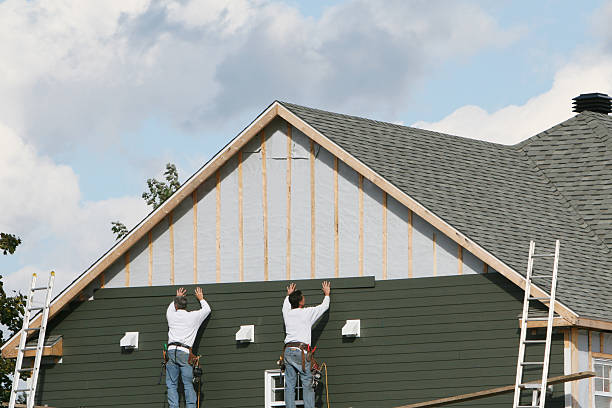 Professional Siding Replacement technician working in Warren, OR